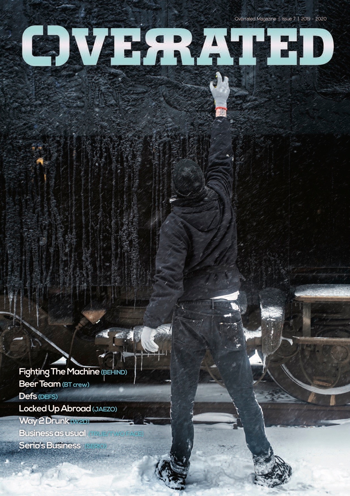 The cover of overrated magazine issue #7 showing someone in the snow spraypainting a frozen train black